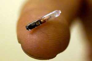 Microchip Capsule on finger