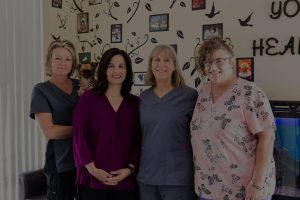 staff with beautiful wall frames backgroung
